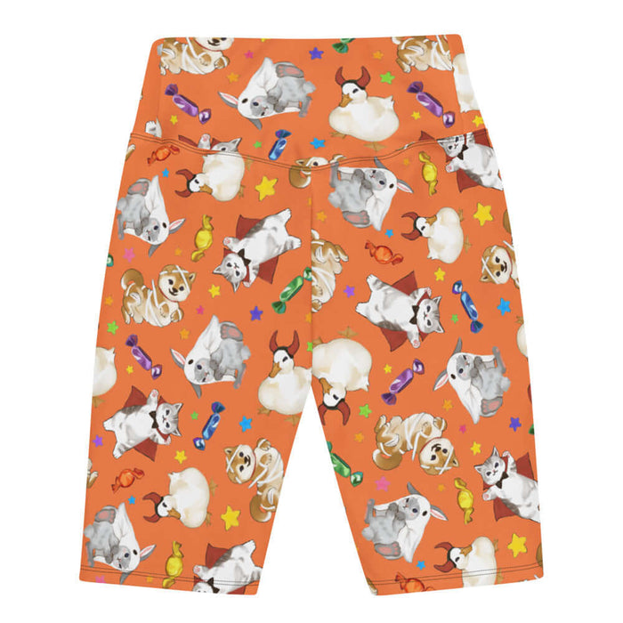 Trick or Treaters alternative biker shorts in pumpkin orange with mummy puppies and wrapped candy