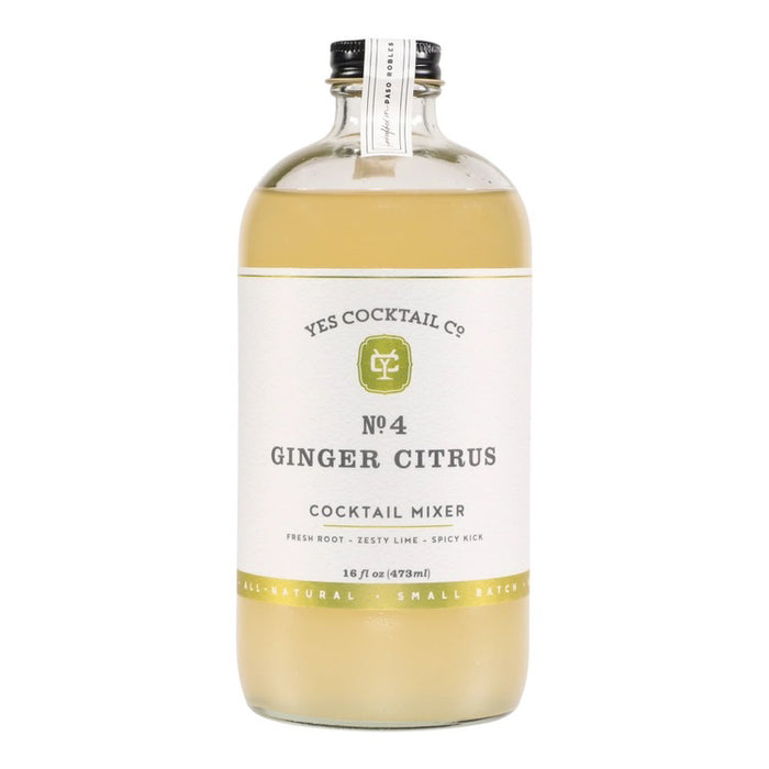 A clear glass 16 fl oz (473 ml) bottle of YES COCKTAIL CO - GINGER CITRUS COCKTAIL MIXER with a white label, green accents, and black text. The pale yellow mixer delivers a zesty ginger citrus kick—perfect for mule cocktails.